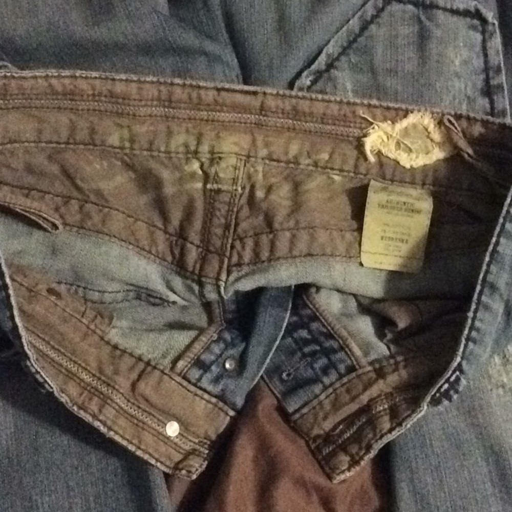 Stitch's Bootcut Distressed Jeans